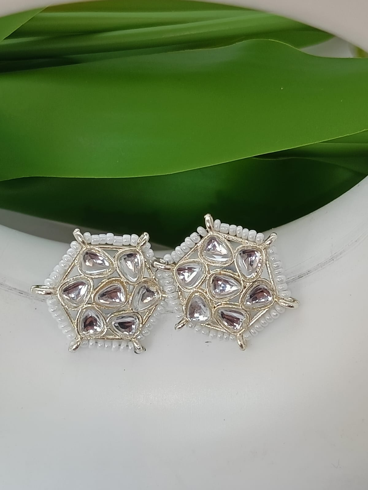 TRADITIONAL WHITE EAR STUD