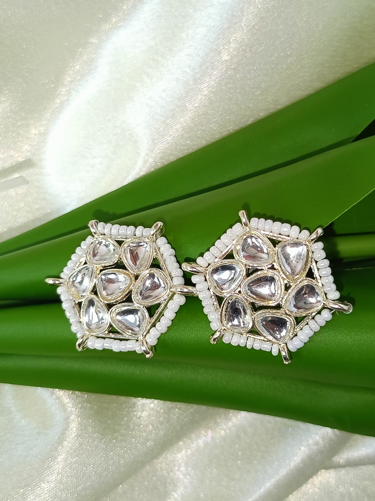 TRADITIONAL WHITE EAR STUD