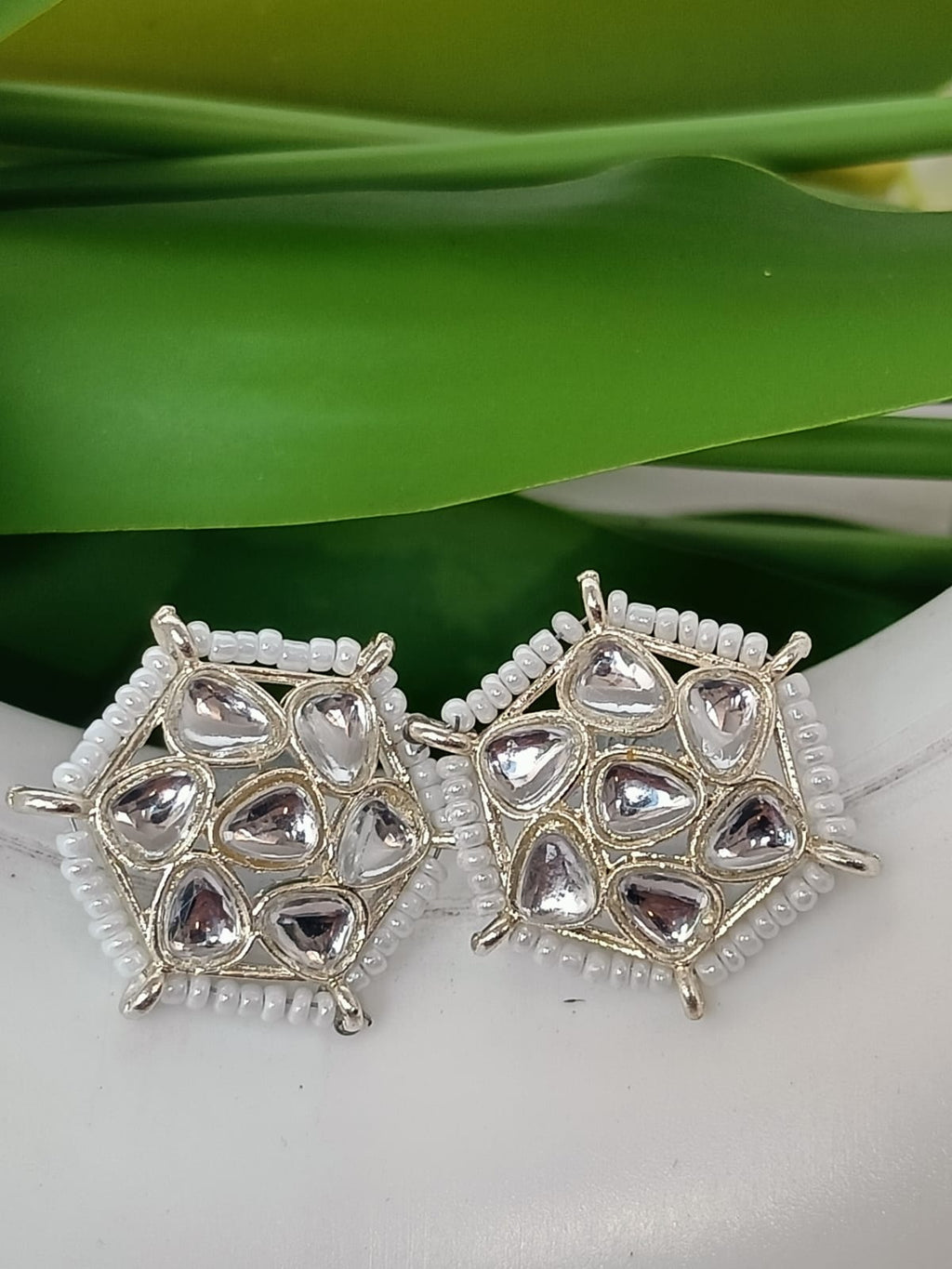 TRADITIONAL WHITE EAR STUD